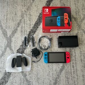 Nintendo Switch with Neon Blue and Neon Red Joy‑Con